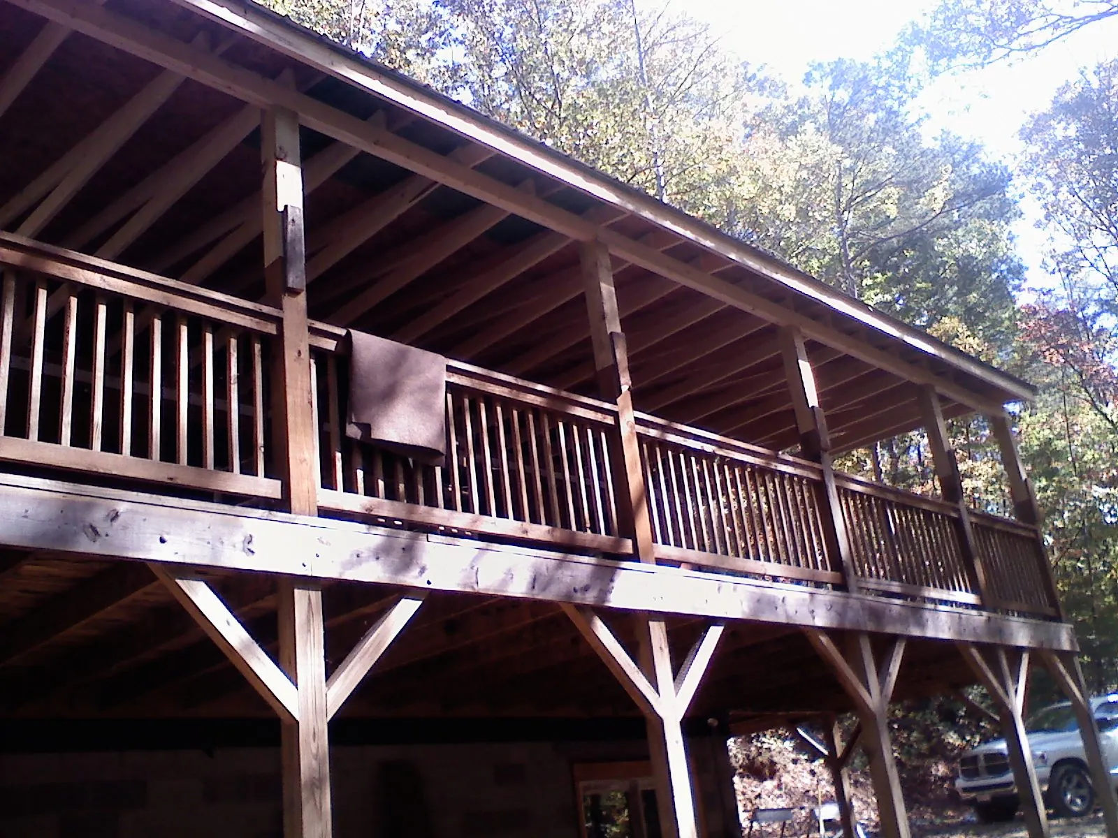 Timber framing under a new elevated porch and deck — Roof Leak Repair in Hartly by Roofing Brothers